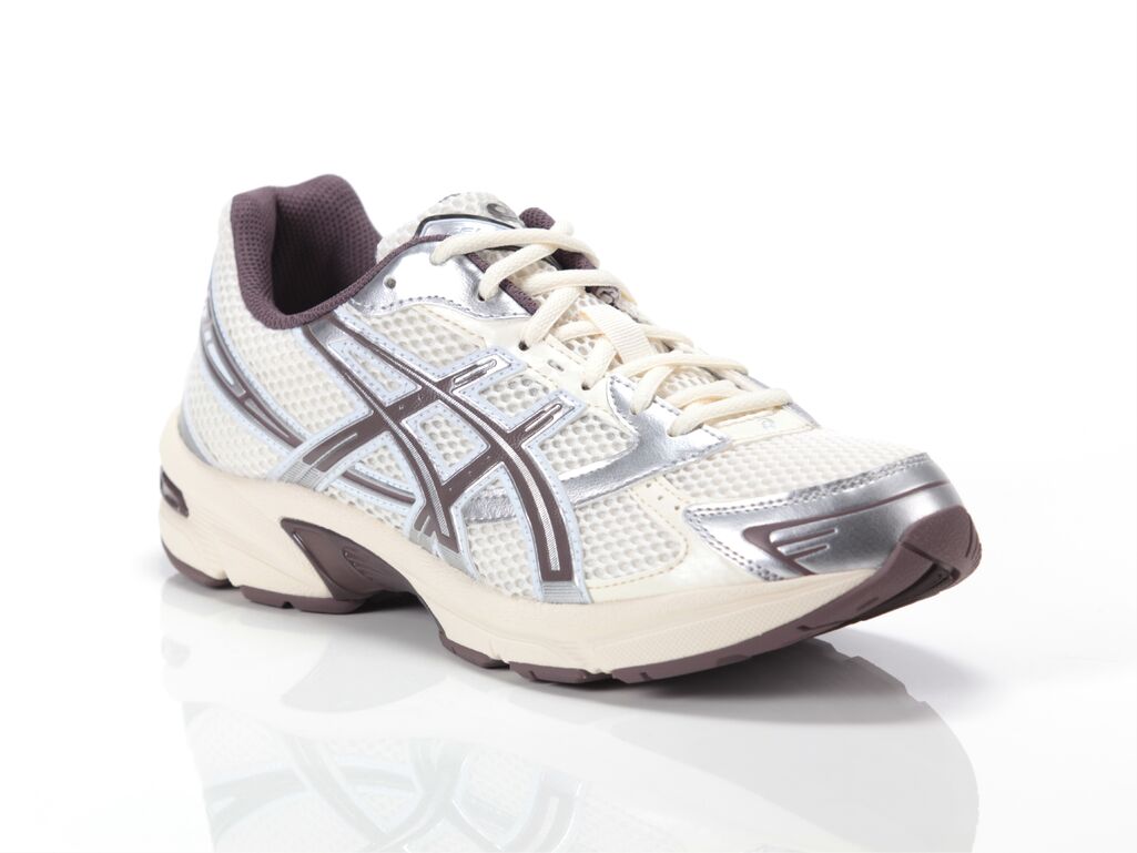  Asics Gel - 1130 - Sneakers unisex Asics. Disponibile in diverse taglie: 40, 41, 42, 43, 44, 39 e colori bianco panna, argento,