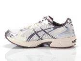  Asics Gel - 1130 - Sneakers unisex Asics. Disponibile in diverse taglie: 40, 41, 42, 43, 44, 39 e colori bianco panna, argento,