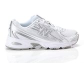  740 - Sneakers unisex New Balance. Disponibile in diverse taglie: 40, 41, 42, 36, 37, 38, 39 e colori argento, bianco. YOUSPORT